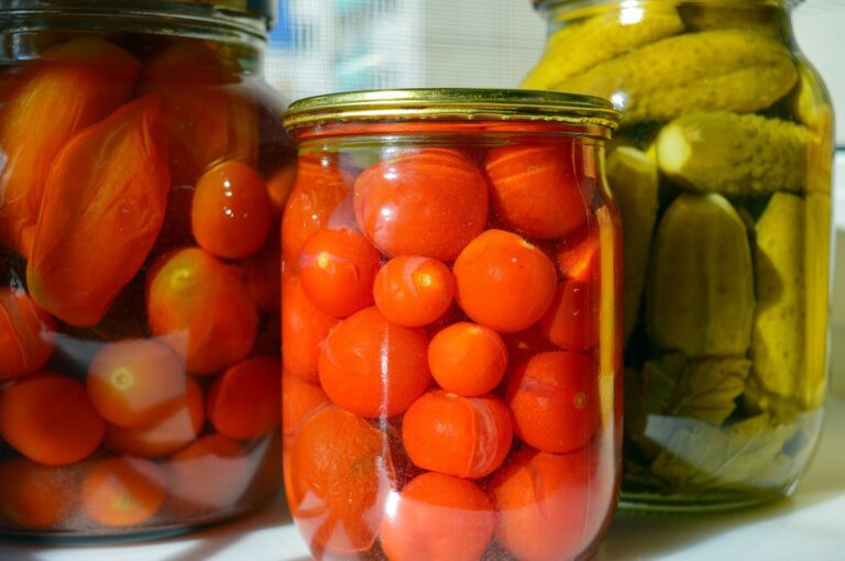 3 jars of pickles - two of cherry tomatoes and one of gherkins