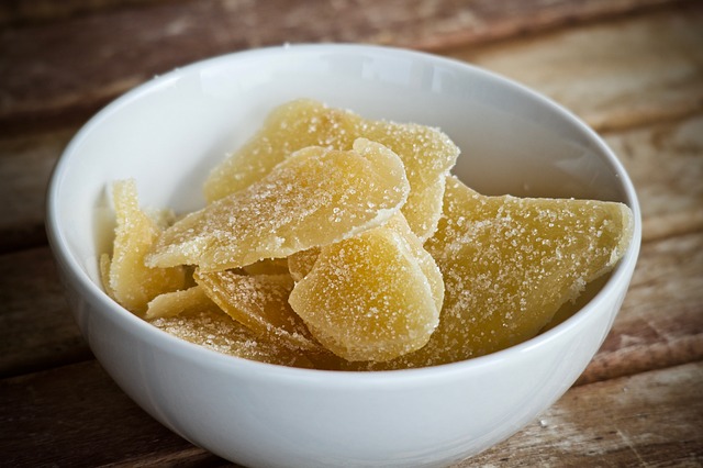 Crystallised ginger pieces in white bowl