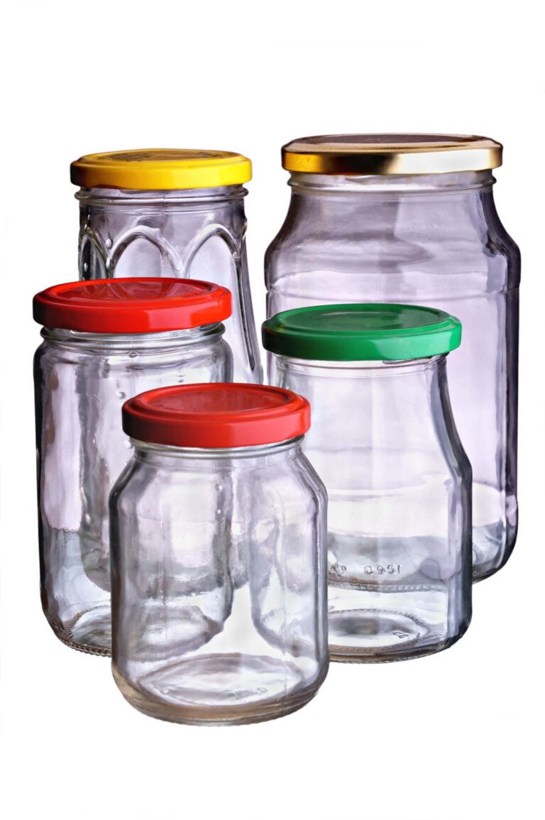 A range of sizes of glass preserving jars with different bright coloured lids.