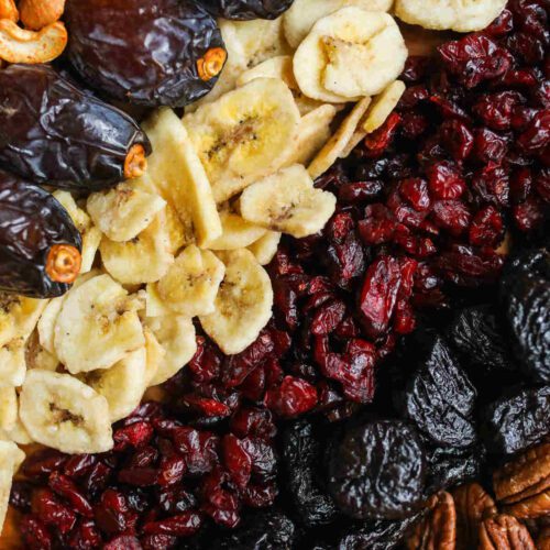 Diagonal rows of a range of dried fruits.